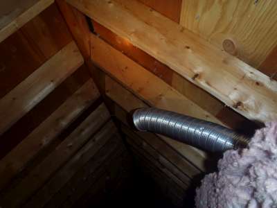 Bathroom fan vents into the attic.